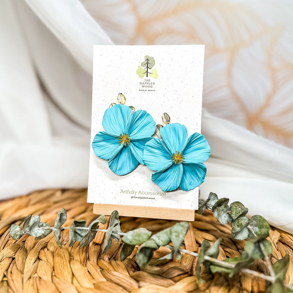 The Dappled Wood Fall 2025 Flora collection limited edition NuMomish aqua flower earrings, handmade lightweight jewelry for moms, everyday outfits, and casual chic looks.