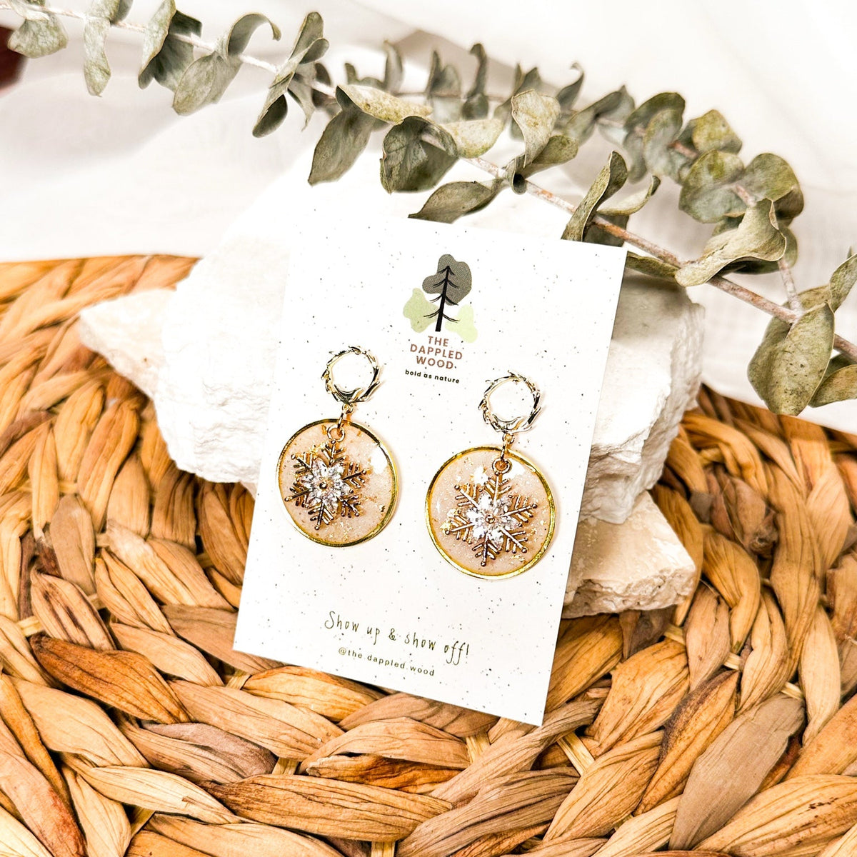 Judy snowflake earrings with Ivory Coast faux stone and gold toned details