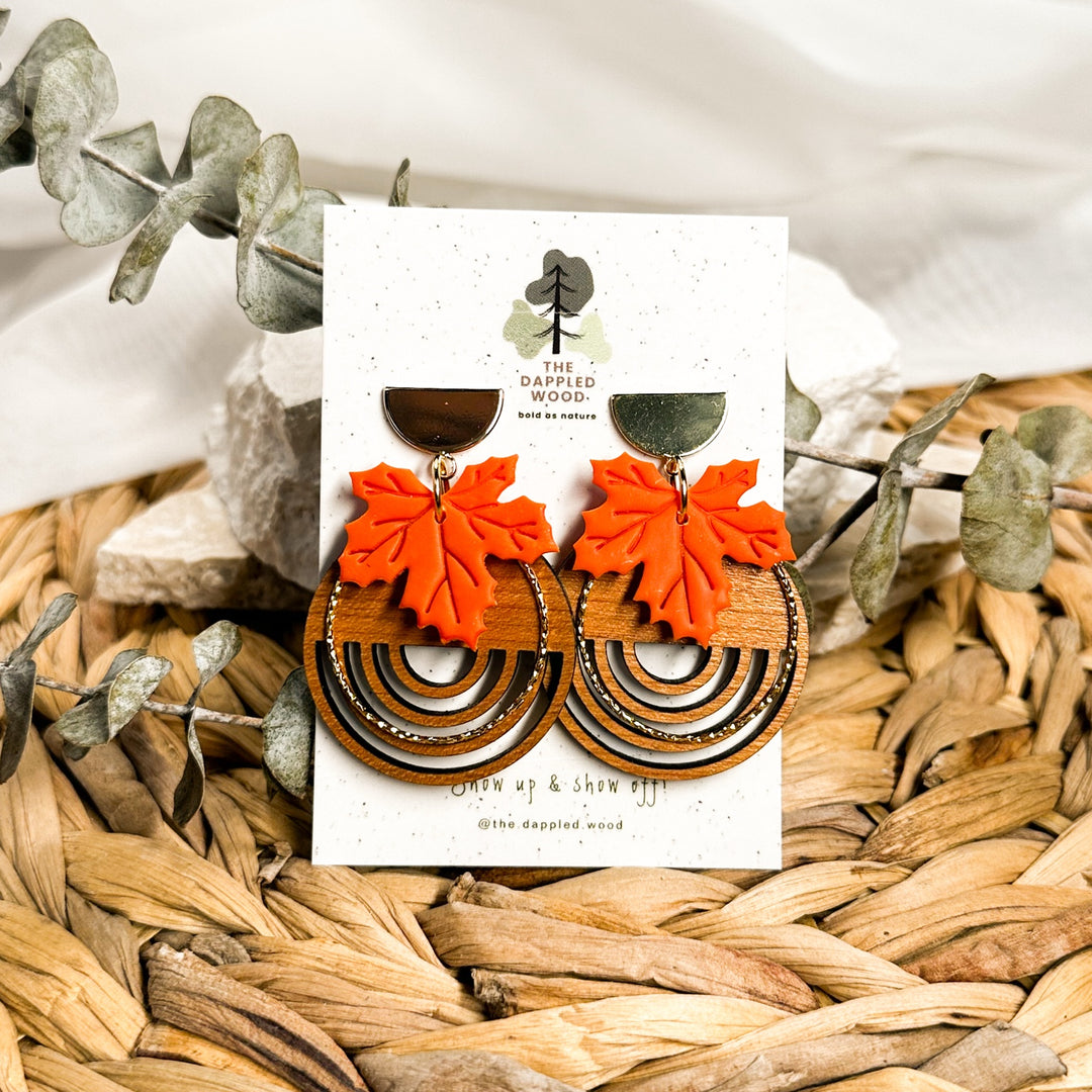 Arden handmade maple leaf and real wood statement earrings in burnt orange