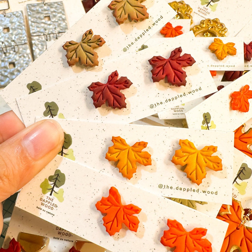 Briar small maple leaf stud earrings in fall colors, handmade polymer clay earrings by The Dappled Wood