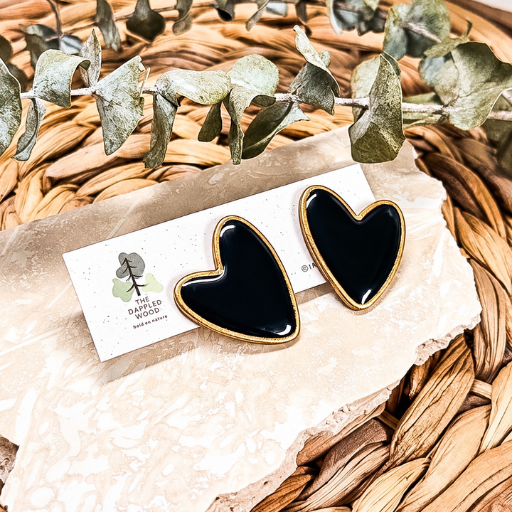 Black Dolly heart statement stud earrings with gilded edges by The Dappled Wood.