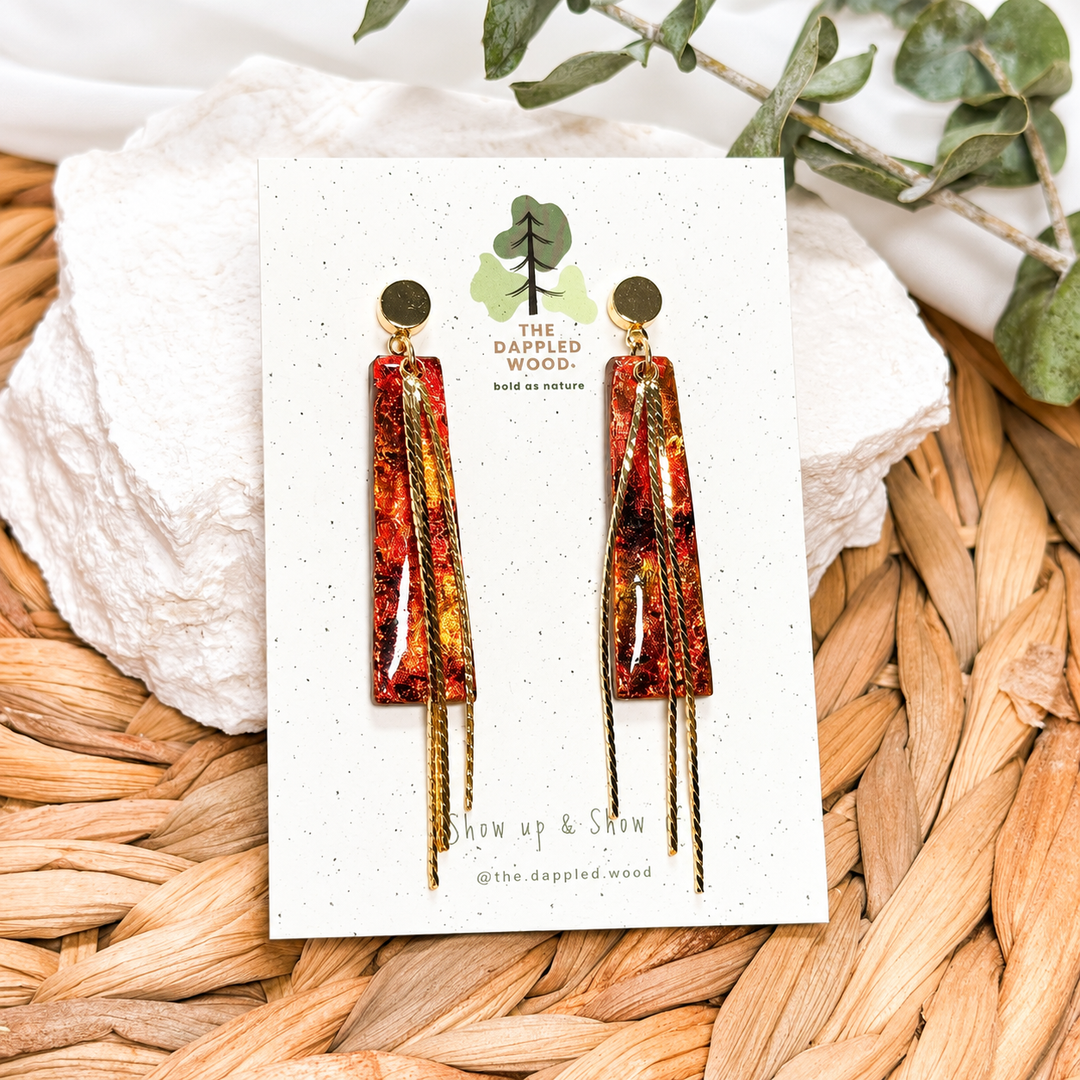 Marisol faux Mexican fire opal tassel earrings displayed on a The Dappled Wood product card.
