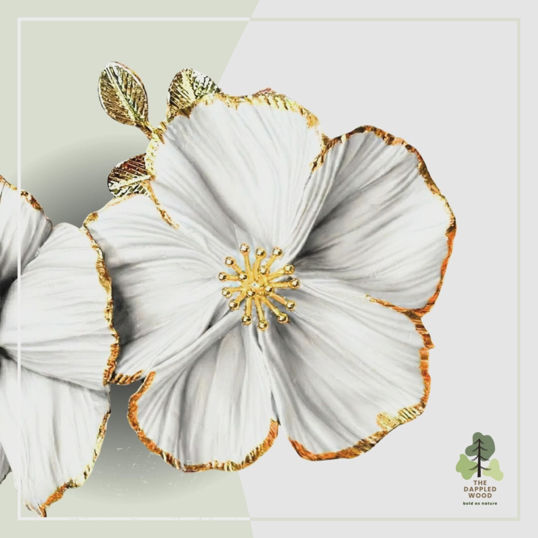 Video flashing through a collection of colorful flower earrings from The Dappled Wood, showcasing multiple shades and sculpted petal designs.