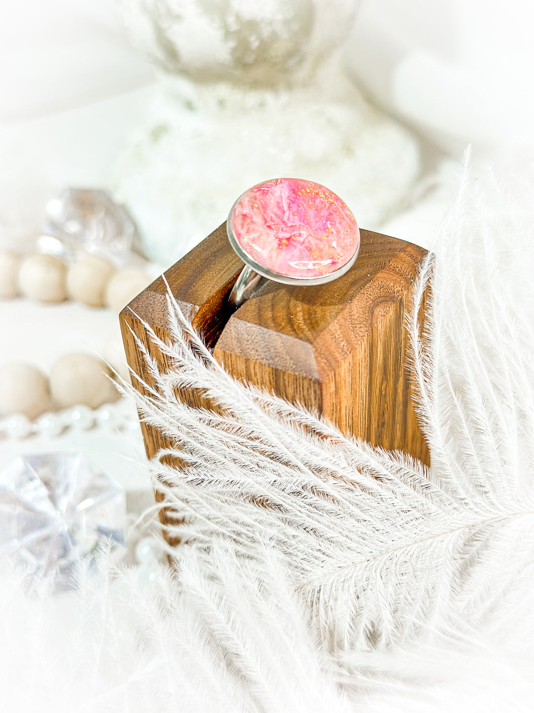 The Dappled Wood bridal ring, featuring a handcrafted polymer clay design with intricate detailing, a unique keepsake or wedding accessory.