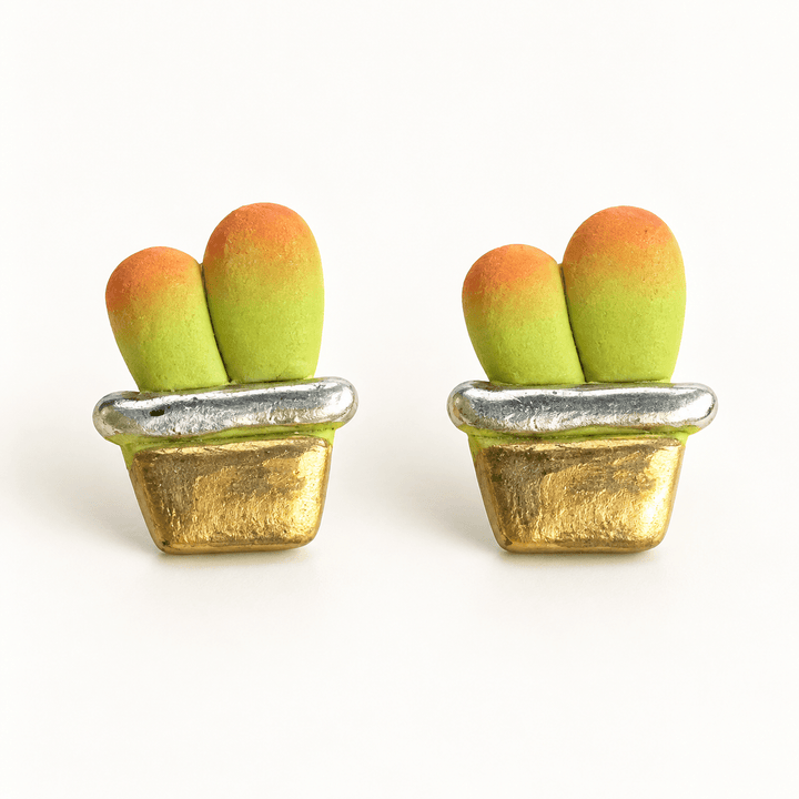 Ari potted cactus stud earrings with lime green and orange cactus lobes in gold-colored pots with silver-colored rims