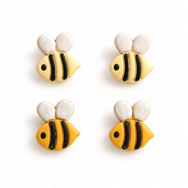 Beatrix bee stud earrings in Pastel Yellow and Golden Yellow with black stripes and white wings