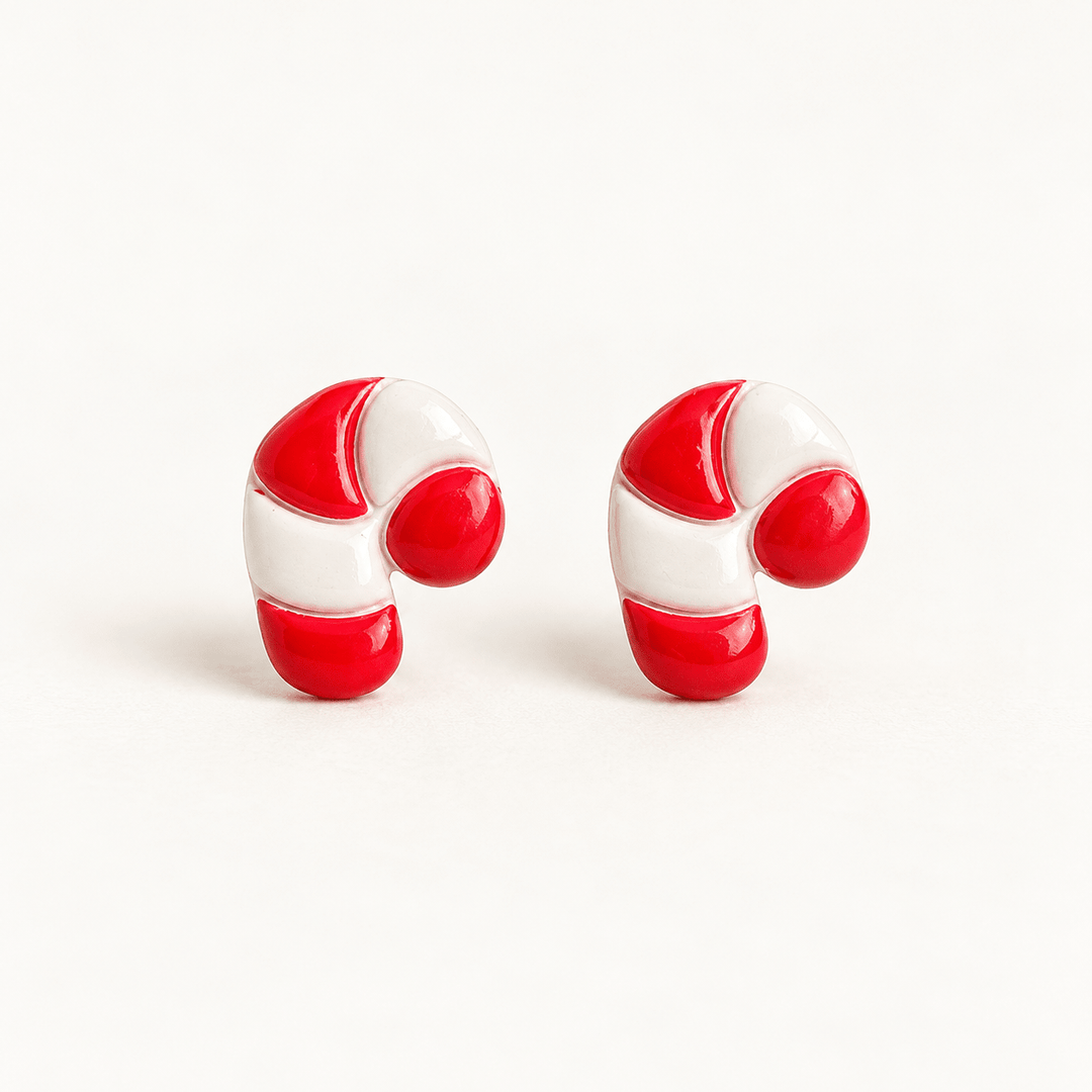 Claudette handmade red and white candy cane stud earrings on white.