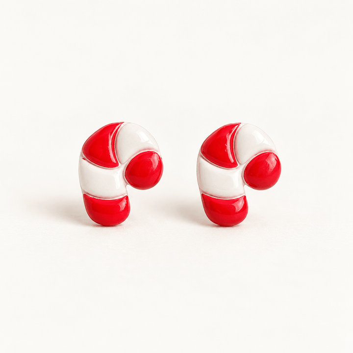 Claudette handmade red and white candy cane stud earrings on white.