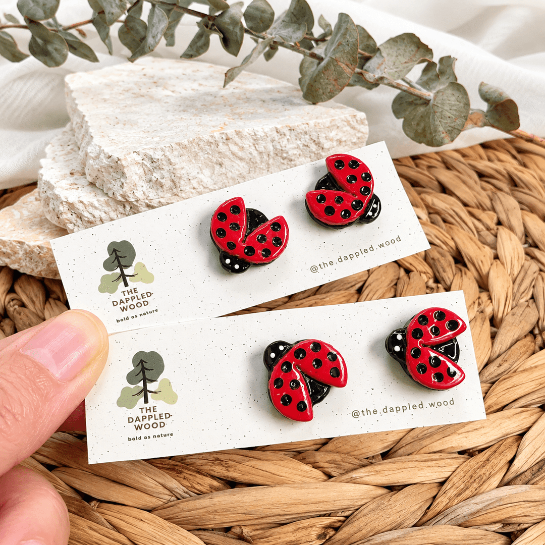 Handmade Dotty red and black ladybug studs on The Dappled Wood display cards