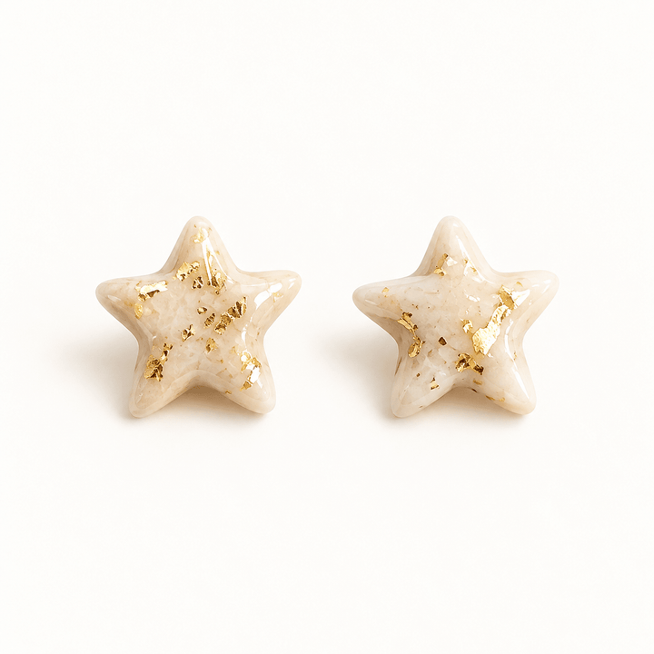 Estelle creamy ivory star stud earrings with gold flecks and a glossy finish