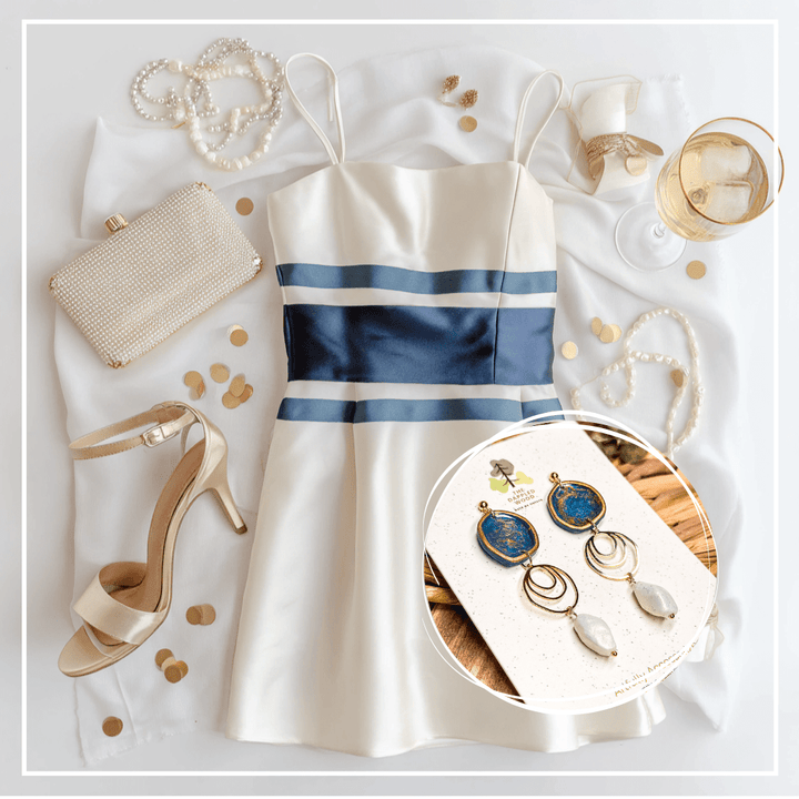 The Dappled Wood’s Rhea navy blue and faux baroque pearl statement earrings.