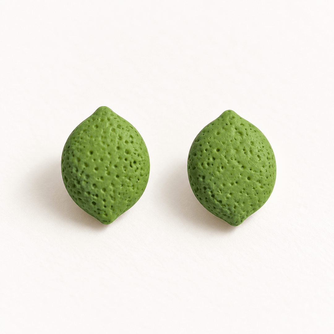 Lula green lime stud earrings with textured rind and a matte finish