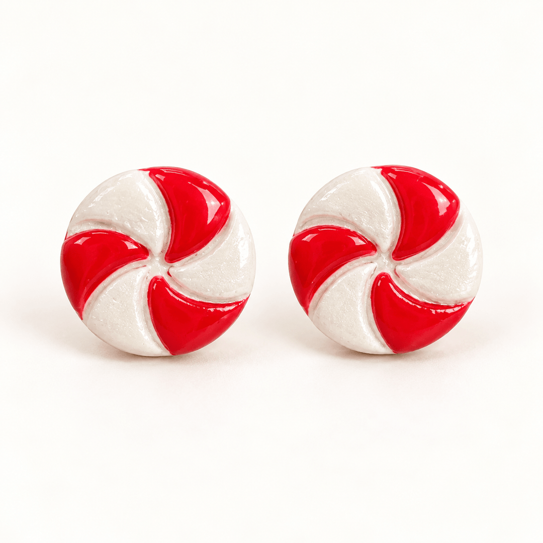 Merryn handmade round peppermint stud earrings with red and pearly white swirls on white.