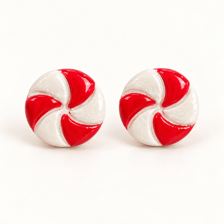 Merryn handmade round peppermint stud earrings with red and pearly white swirls on white.