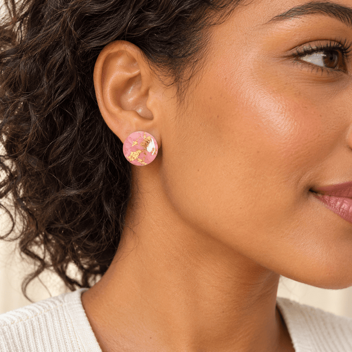 AI-generated styling preview of the Odette circle stud; scale is illustrative