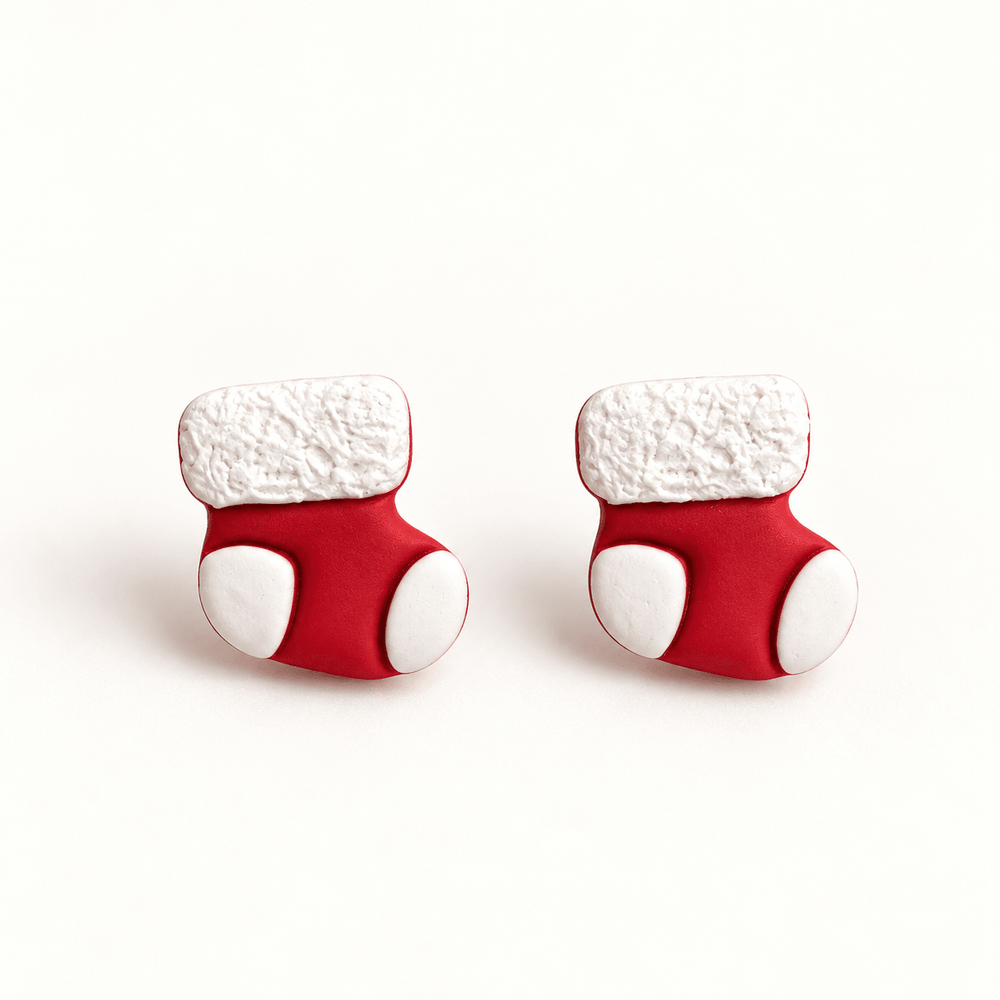 Oona handmade Christmas stocking studs with textured white cuffs, heels and toes on white.