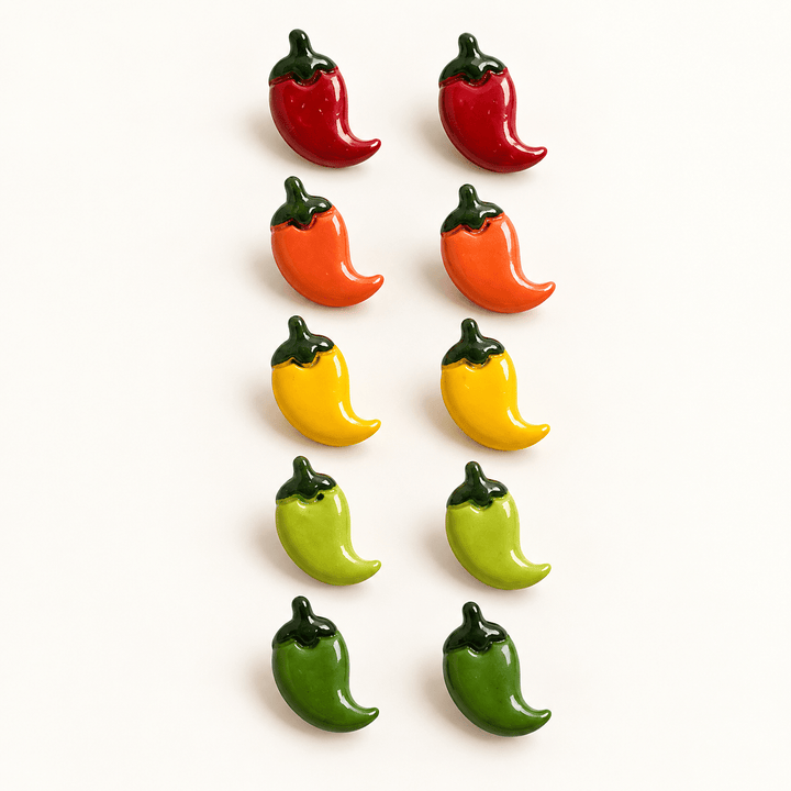 Pilar handmade chili pepper stud earrings in all five colors on white.