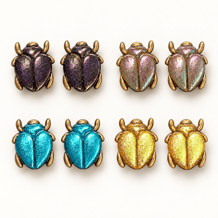 Saskia color-shift scarab beetle studs in Dark Plum, Sage Green, Caribbean Blue and Golden Yellow