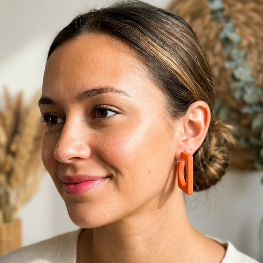 Model wearing Roxie - Chunky Square Hoops.
