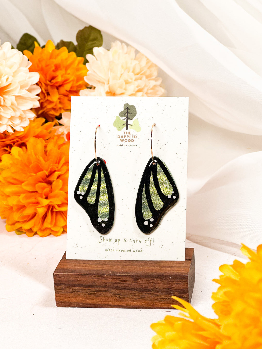 Green butterfly wing earrings from The Dappled Wood, bold and lightweight hypoallergenic jewelry inspired by nature.