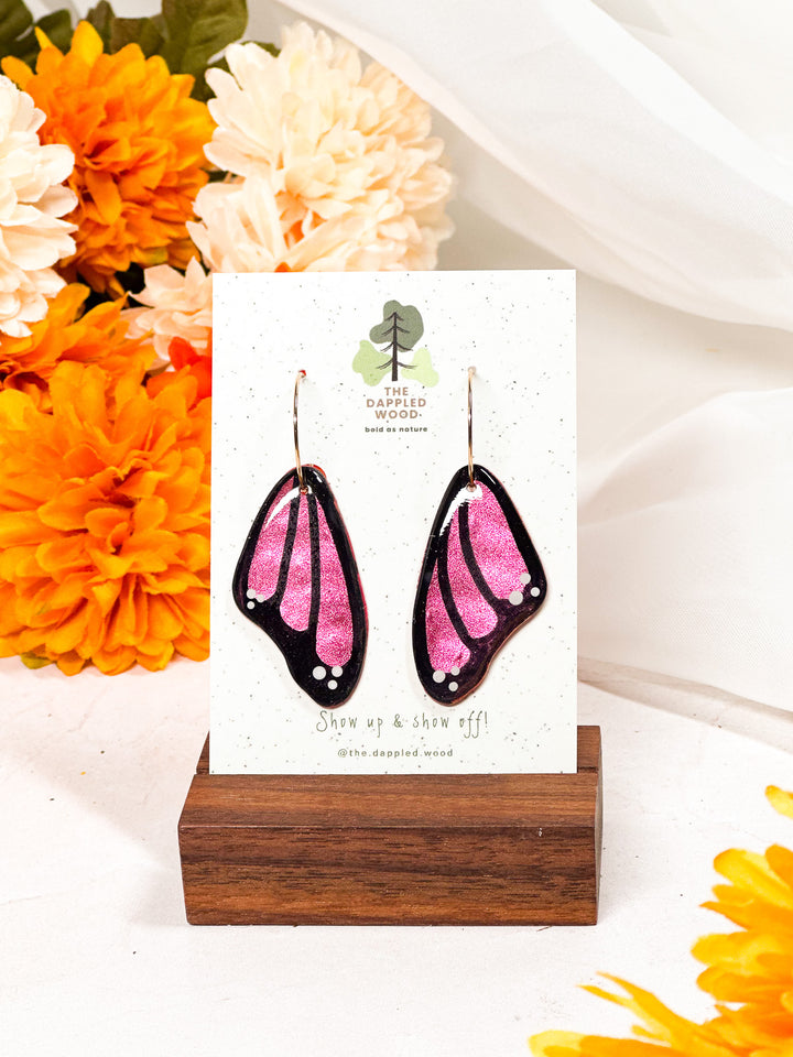 Pink butterfly wing earrings from The Dappled Wood, delicate yet bold lightweight statement jewelry.