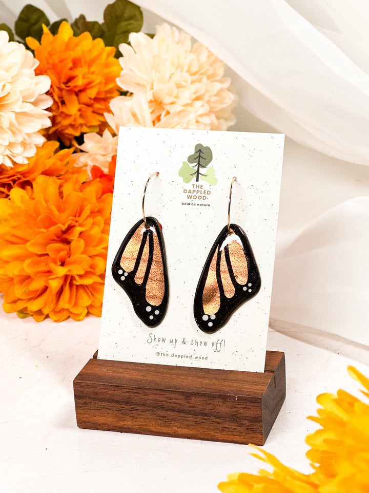 Red butterfly wing earrings from The Dappled Wood, a lightweight and hypoallergenic statement piece inspired by nature.