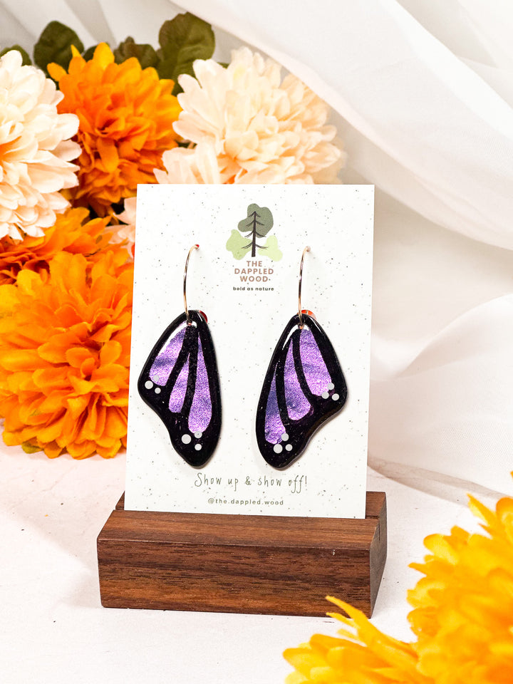 Violet butterfly wing earrings from The Dappled Wood, premium handcrafted hypoallergenic jewelry inspired by nature.