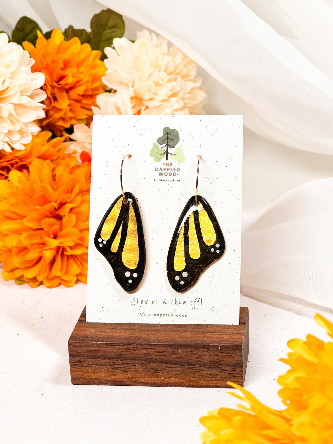 Yellow butterfly wing earrings from The Dappled Wood, nature-inspired lightweight statement jewelry for all-day comfort.