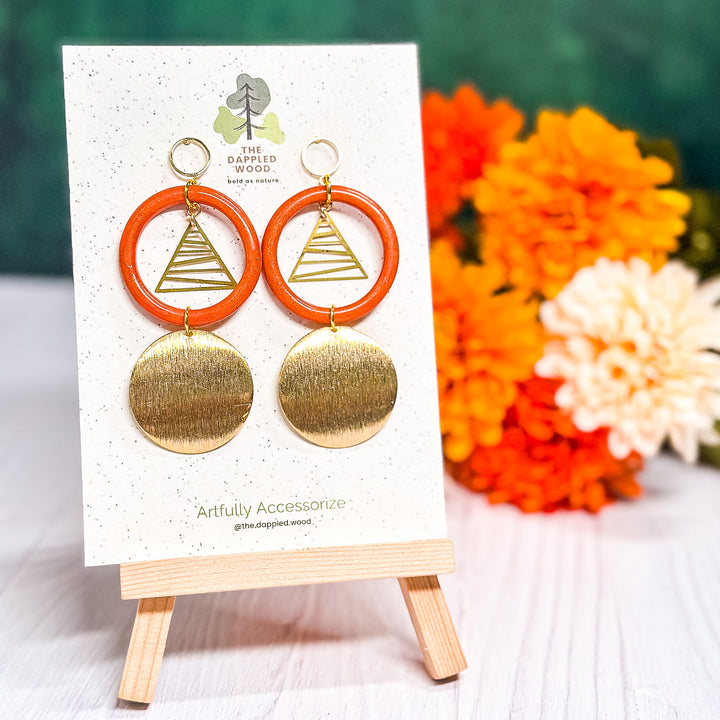 XL burnt orange circle earrings with brushed gold accents, bold fall statement jewelry from The Dappled Wood.