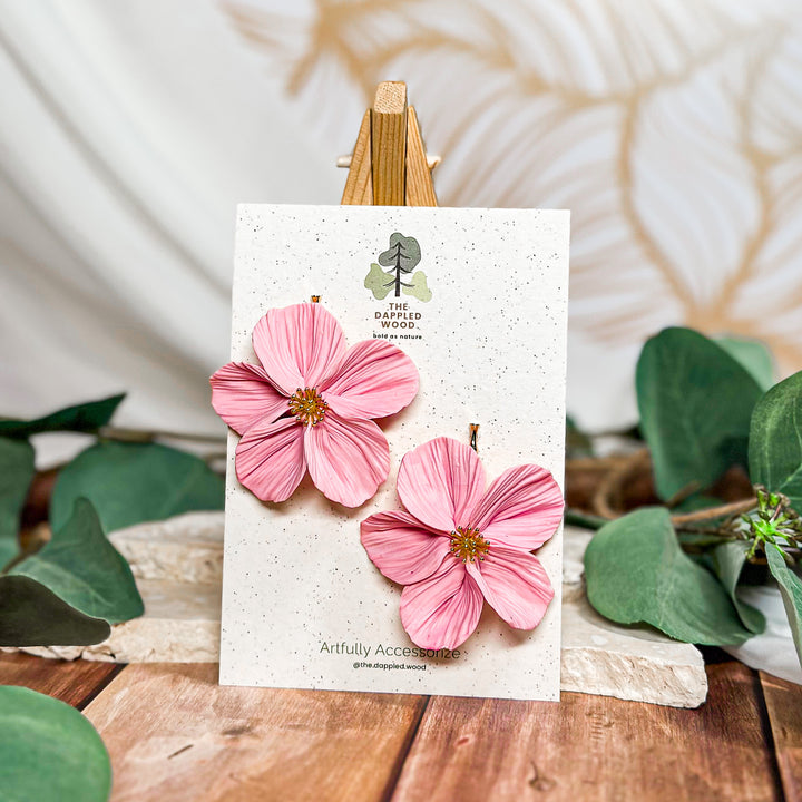 The Dappled Wood Frosted Petals handsculpted winter floral earrings in blush pink featuring nickel free gold bamboo posts from the New Year 2025 collection.