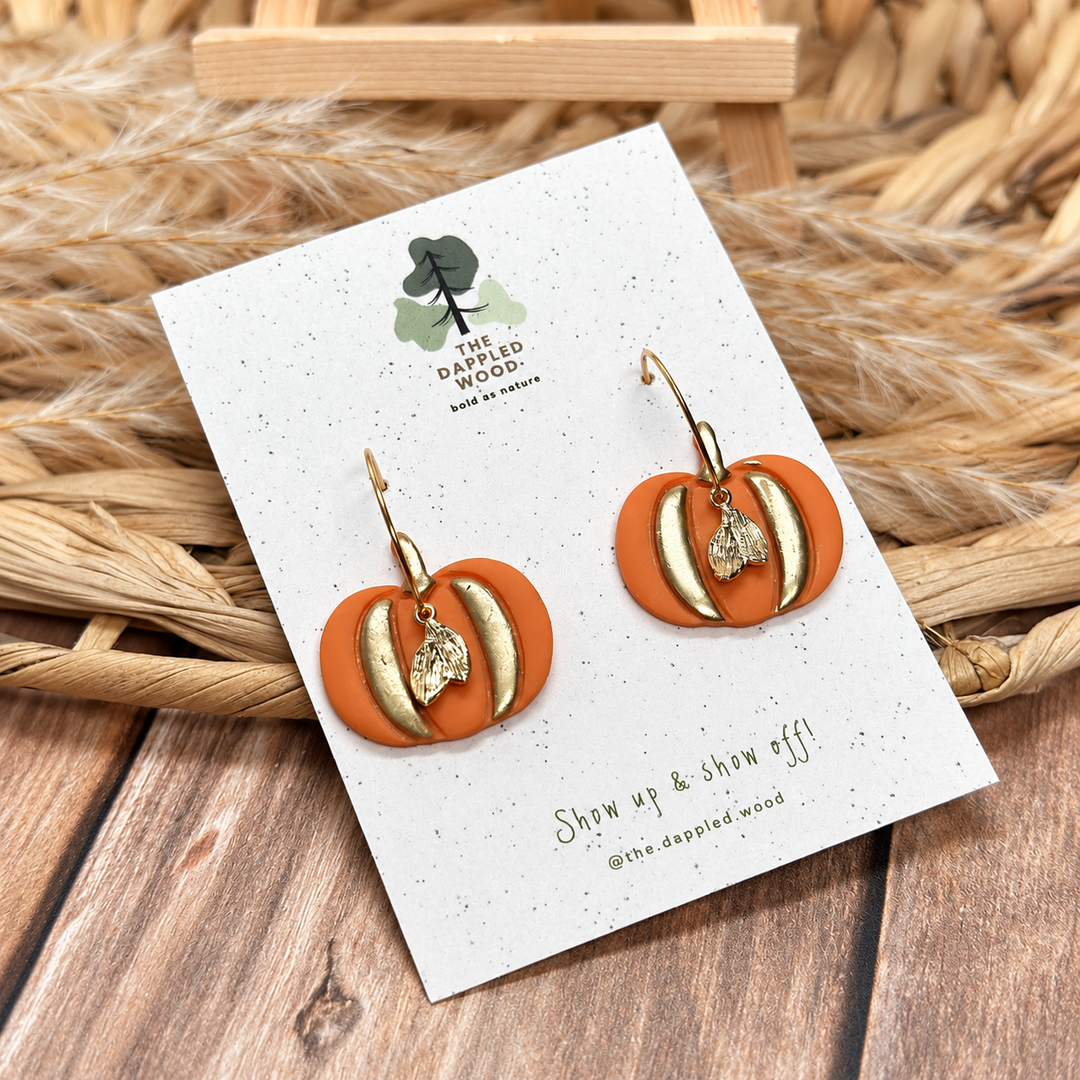 Winona gilded pumpkin dangle earrings with hand-painted gold details by The Dappled Wood.